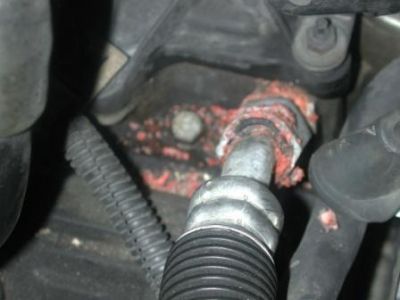 http://www.2carpros.com/forum/automotive_pictures/362172_upper_heater_hose_connection_1.jpg