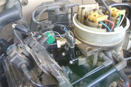 http://www.2carpros.com/forum/automotive_pictures/46392_1990_GMC_Idle_Air_Control_and_Throttle_Position_Sensor_1.jpg