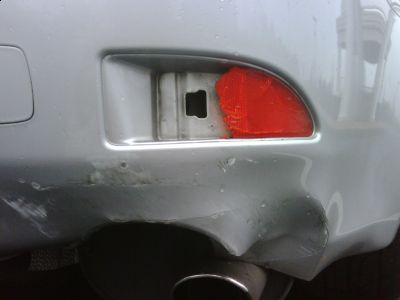 http://www.2carpros.com/forum/automotive_pictures/471667_Lexus_IS_bumper_and_tailpipe_2.jpg