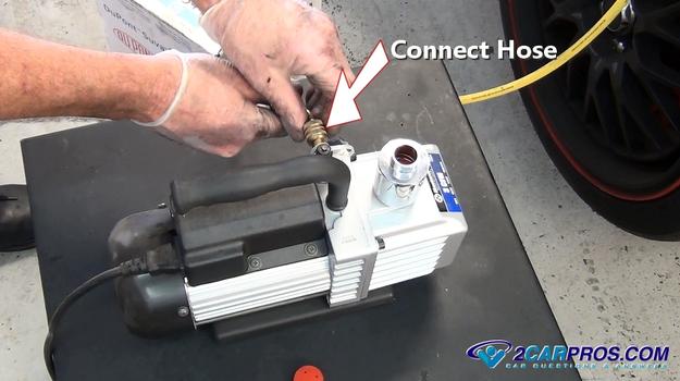 connect hose to AC vacuum pump