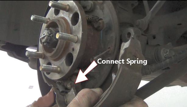 connect parking brake lower spring