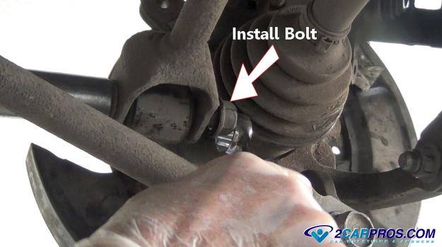 install front swing arm bolt