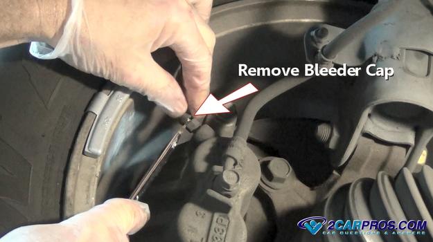 remove brake bleeder cap