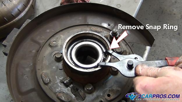 remove rear axle bearing snap ring