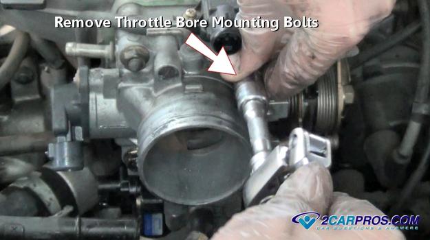 removing throttle bore mounting bolts