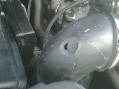 https://www.2carpros.com/forum/automotive_pictures/271991_hole_in_inlet_1.jpg