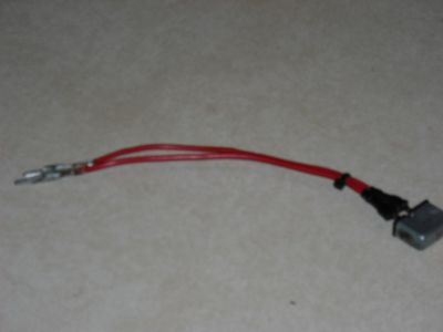 https://www.2carpros.com/forum/automotive_pictures/523404_red_wire_found_under_hood_of_car_1.jpg