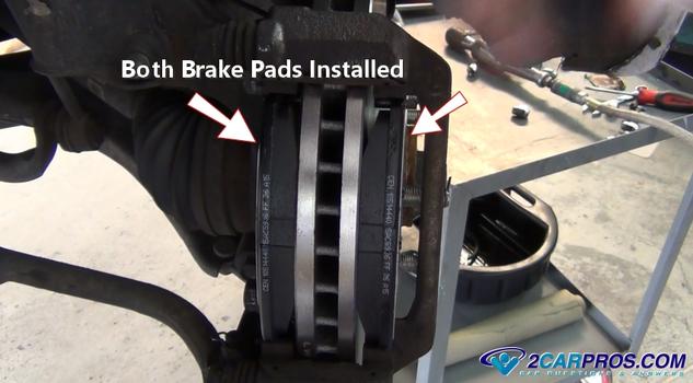 both brake pads installed