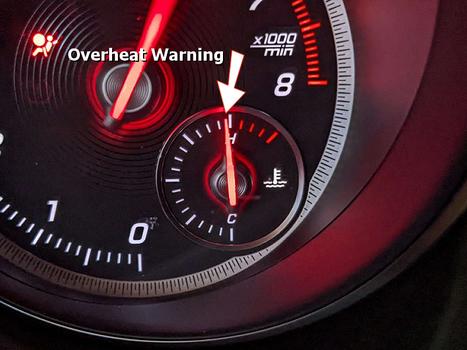 engine overheating warning light