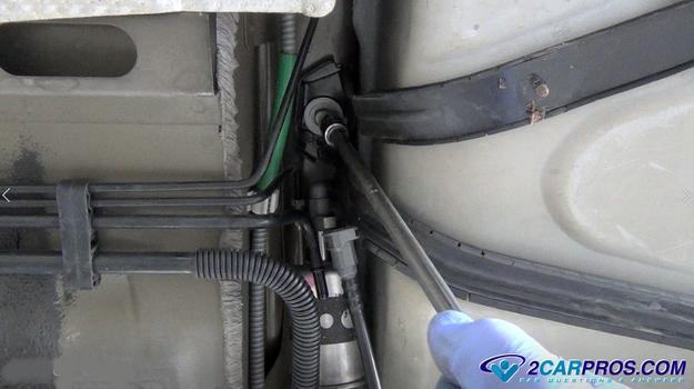 fuel tank strap removal