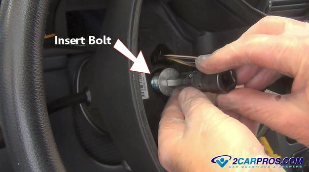 insert steering wheel mounting bolt
