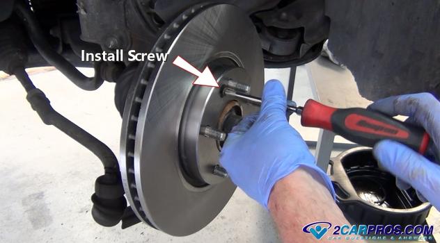 install rotor mounting screw