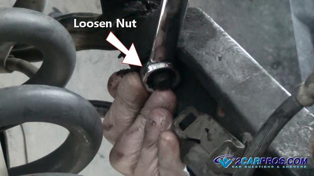 loosen upper ball joint nut