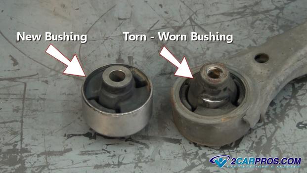 Remove strut bushing from control arm