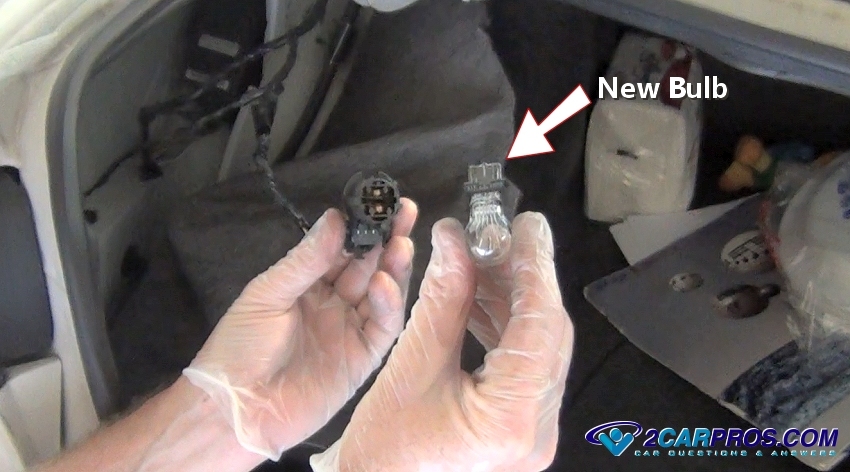 2012 nissan versa brake light replacement