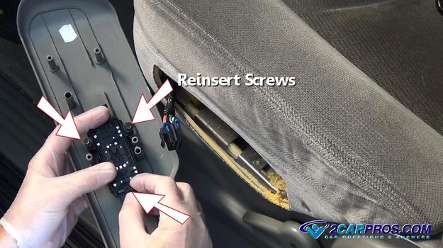 reinsert seat switch mounting screws