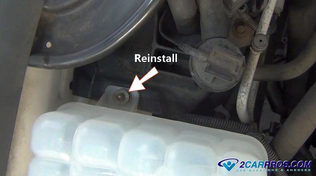 reinstall coolant reservoir mounting bolts