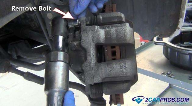 remove brake cailper bolt