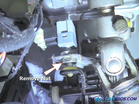 remove brake light switch nut
