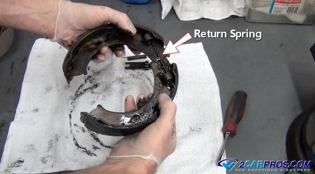 remove brake shoe return spring