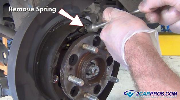 remove brake shoe return springs