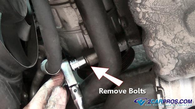 remove compressor mounting bolts
