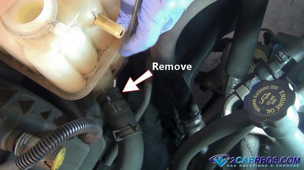 remove coolant reservoir hose lower