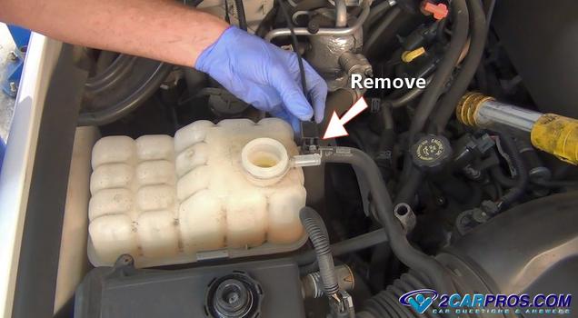 remove coolant reservoir hose