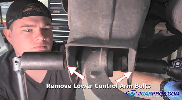 remove lower control arm bolts