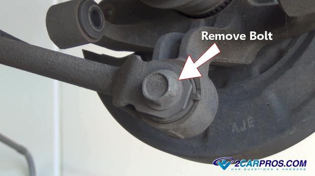 remove rear trailing arm mounting bolt