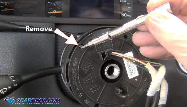 remove steering wheel clock spring mounting bolts
