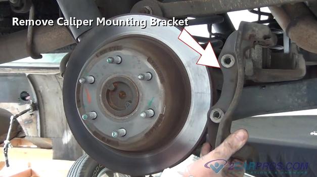 remove caliper mount bracket