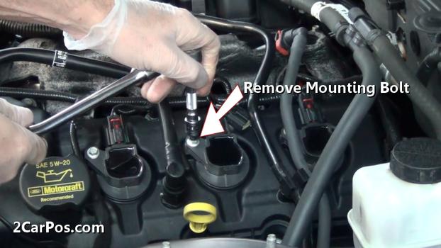 remove ignition coil mounting bolt