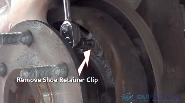 remove parking brake shoe retainer