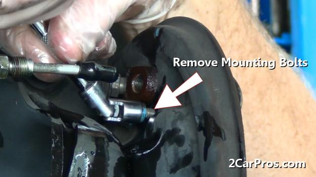 remove wheel cylinder mounting bolts