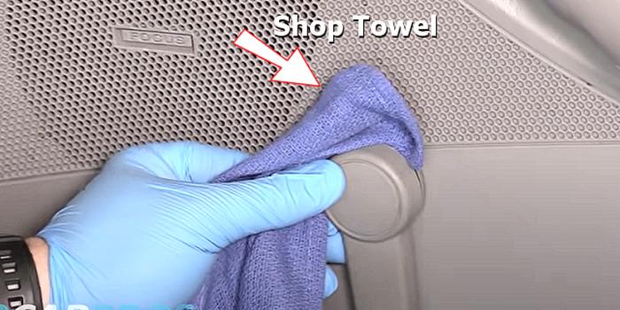 shop towel between window crank