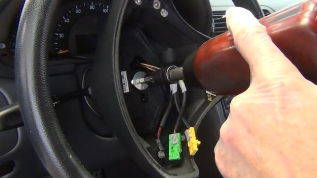 tighten steering wheel mounting bolt