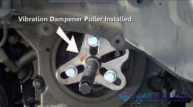 vibration dampener puller installed