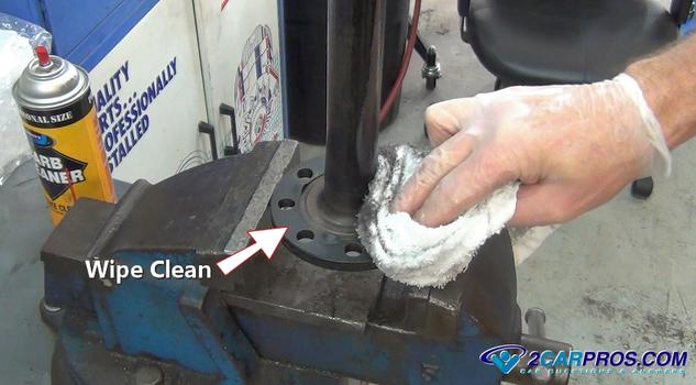 wipe axle flange clean