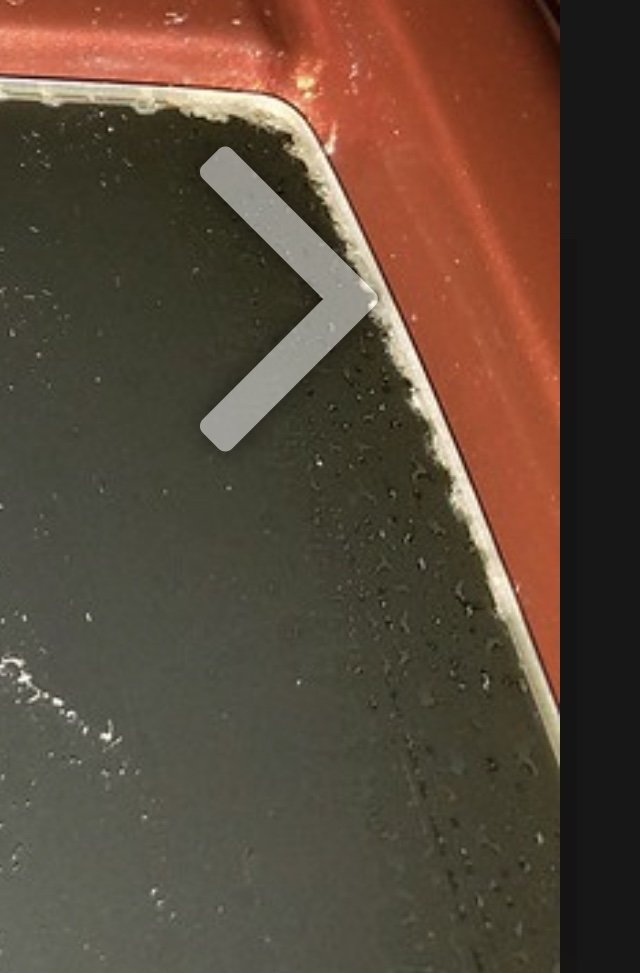 Dots or Bubbles at Sides of Windshield Glass